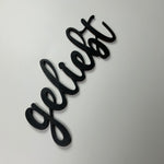 Schriftzug 3D aus Holz "geliebt"