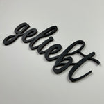 Schriftzug 3D aus Holz "geliebt"
