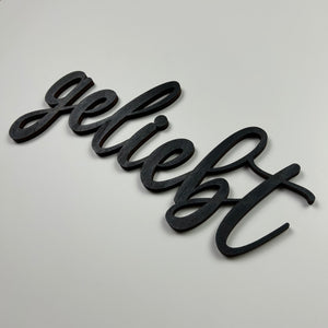 Schriftzug 3D aus Holz "geliebt"
