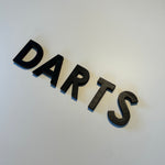 Schriftzug 3D aus Holz "DARTS"